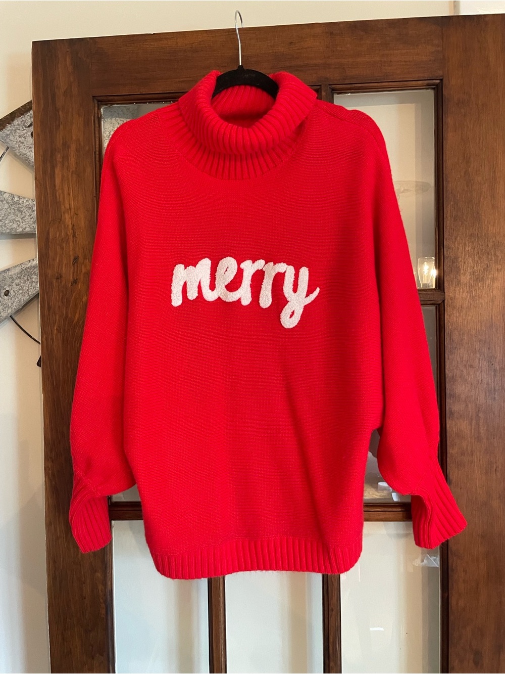 Relaxed Red Turtleneck Sweater with 'Merry' Graphic